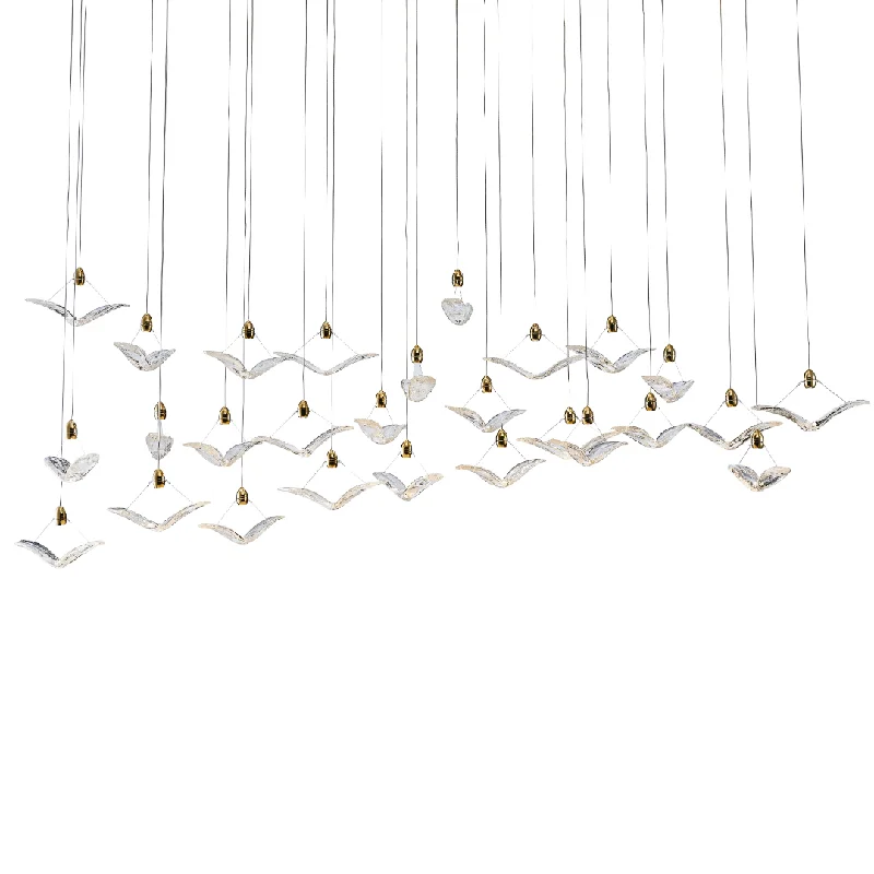 Grand Crystal Chandeliers for a Luxurious Foyer or BallroomGrand Crystal Chandeliers for a Luxurious Foyer or BallroomHeavenly Flock Linear Double Height Chandelier | Ivanka Lumiere