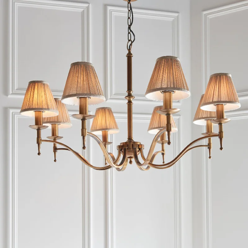 Victorian - Inspired Chandeliers with Intricate MetalworkVictorian - Inspired Chandeliers with Intricate MetalworkStanford 8 Light Antique Brass Chandelier - Beige Shades