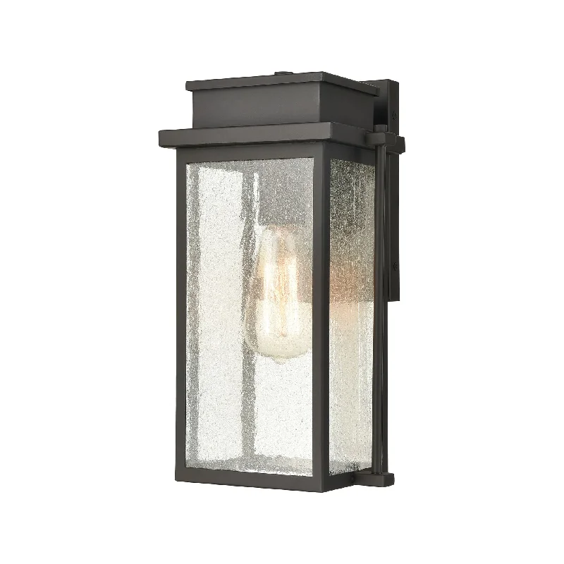 Motion - Sensing Wall Lamps for Hands - Free Illumination in StairwaysMotion - Sensing Wall Lamps for Hands - Free Illumination in StairwaysBraddock Outdoor Wall Lamps in Architectural Bronze with Seedy Glass Enclosure by ELK Lighting